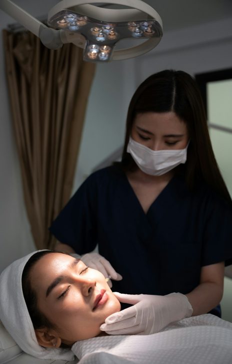 young Asian woman making cosmetology treatment skin injection, Mesotherapy of face beauty care